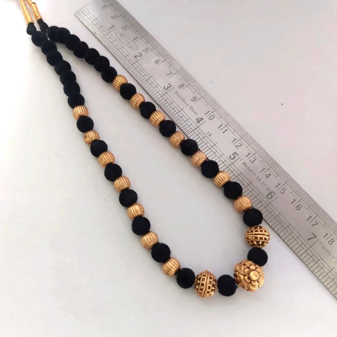 Black Beauty: Black and Golden Beads Necklace