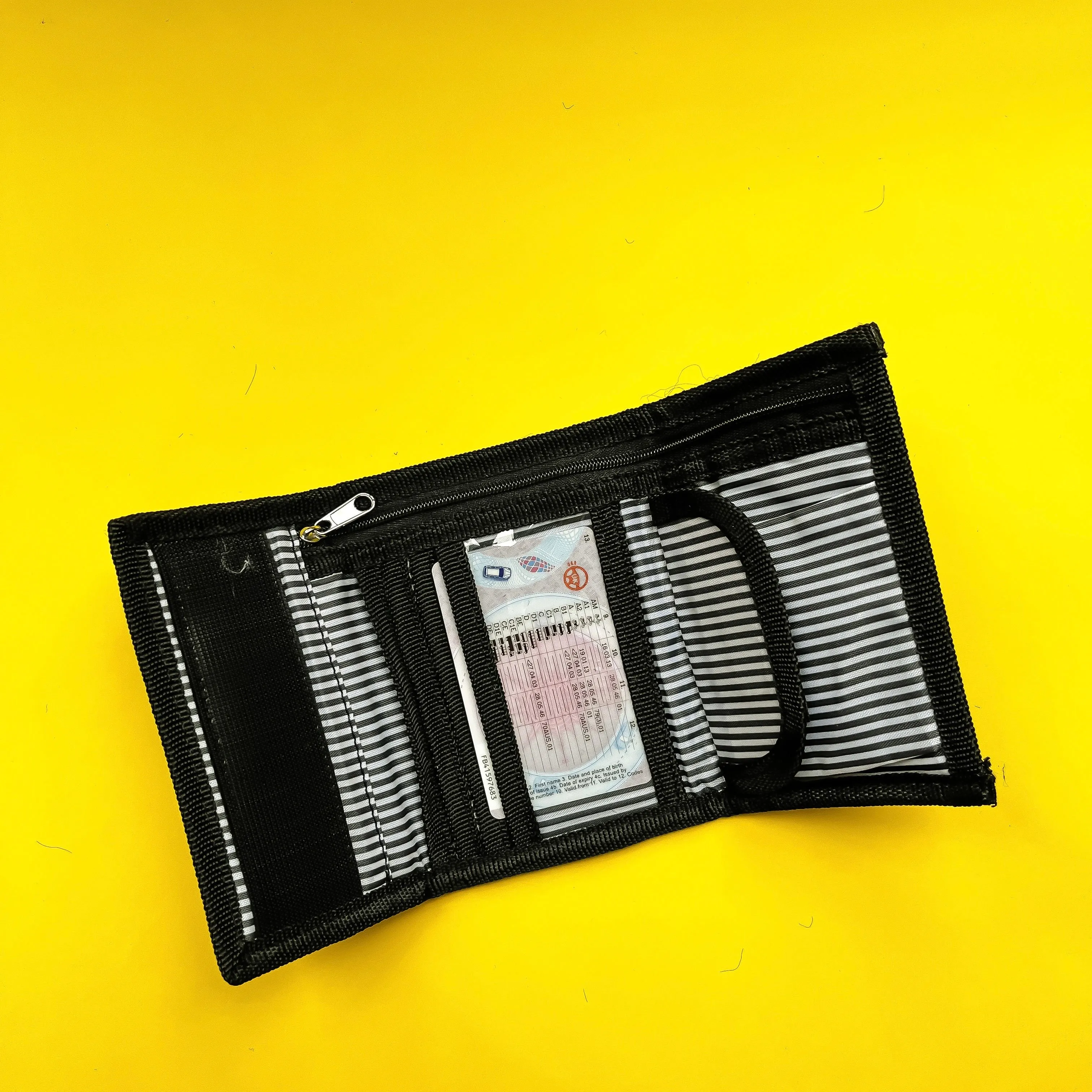 Monochrome tri-fold wallet waterproof coated with zip notes pocket